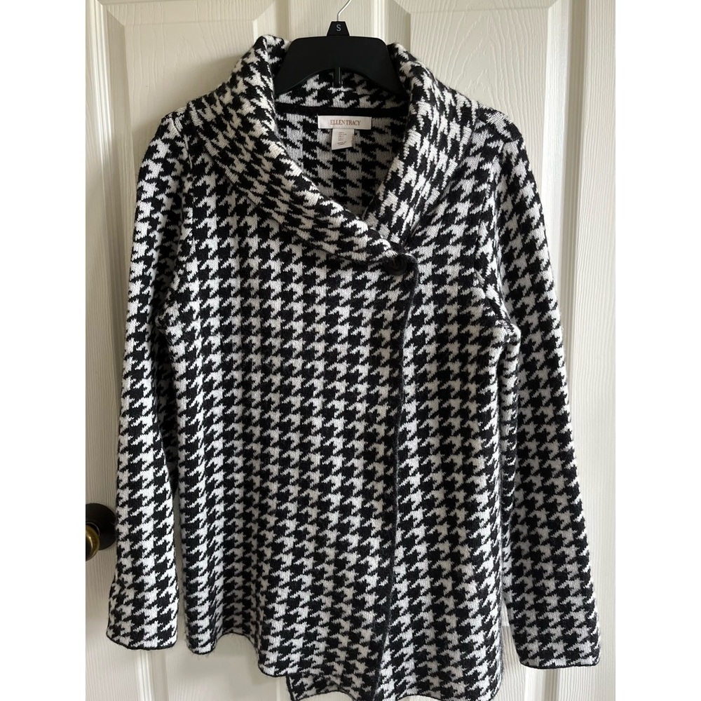 Black and white houndstooth sweater.